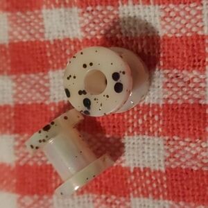 White and Black Speckled Plugs